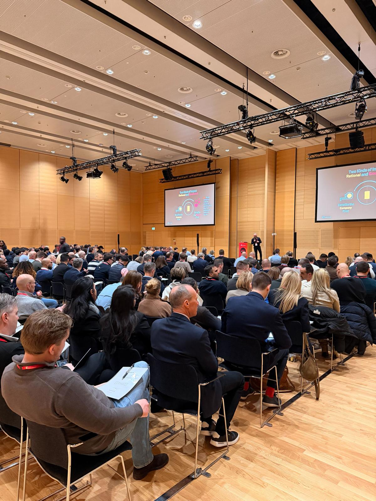 Keynote delivery to a packed auditorium audience